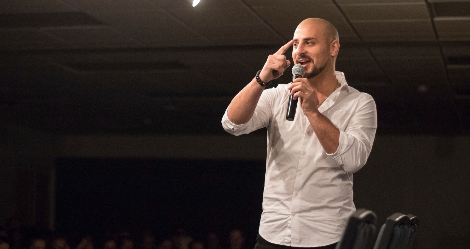 Eric Mina performing on stage